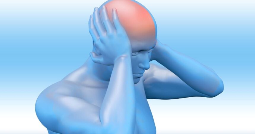 Image of a man clutching his head with headache pain