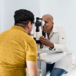 ophthalmologist examining diabetes patient